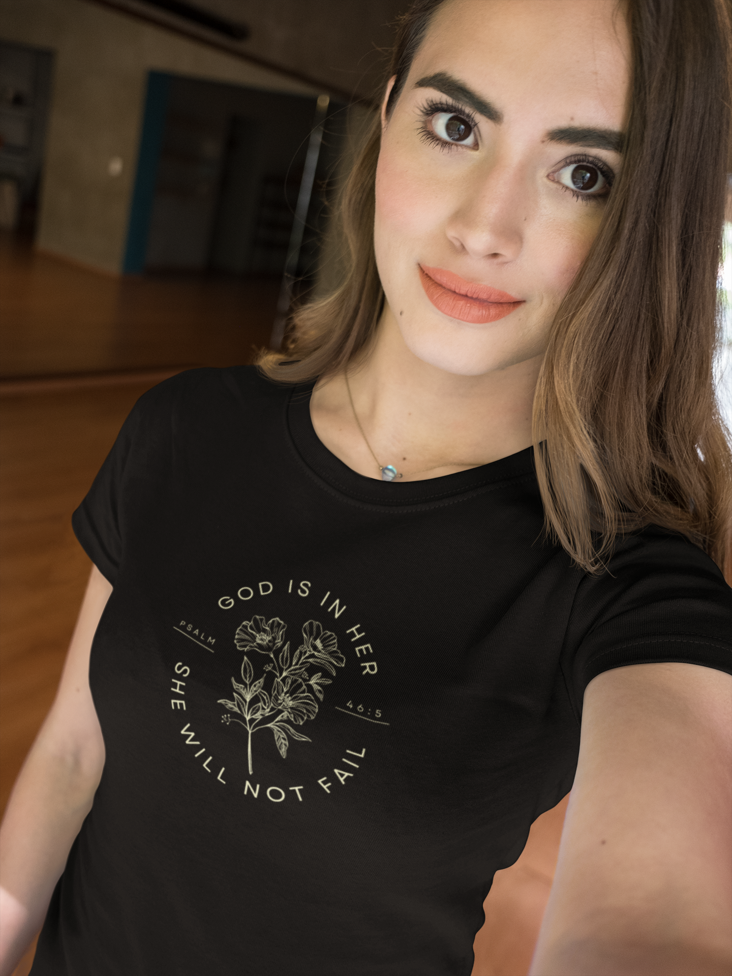 God is In Her Women's Favorite Tee